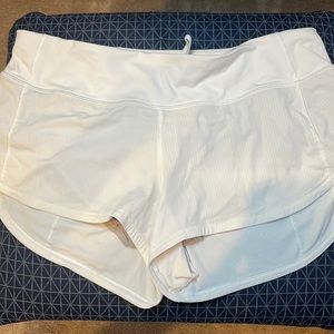 Like new lululemon speed up white shorts size 6